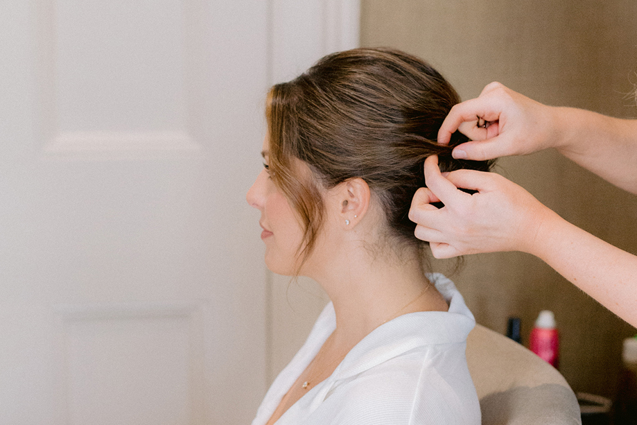 Siân Hair working on up-do for bridal client